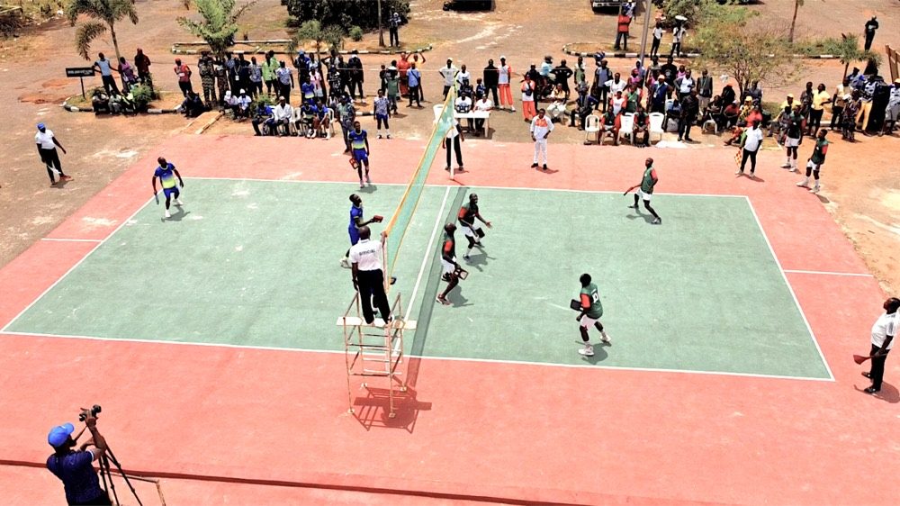 A community sports hub gathering with a crowd of spectators